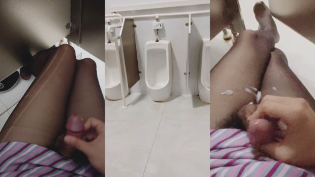 Chinese crossdresser ejaculates in public toilet and there is someone next to it